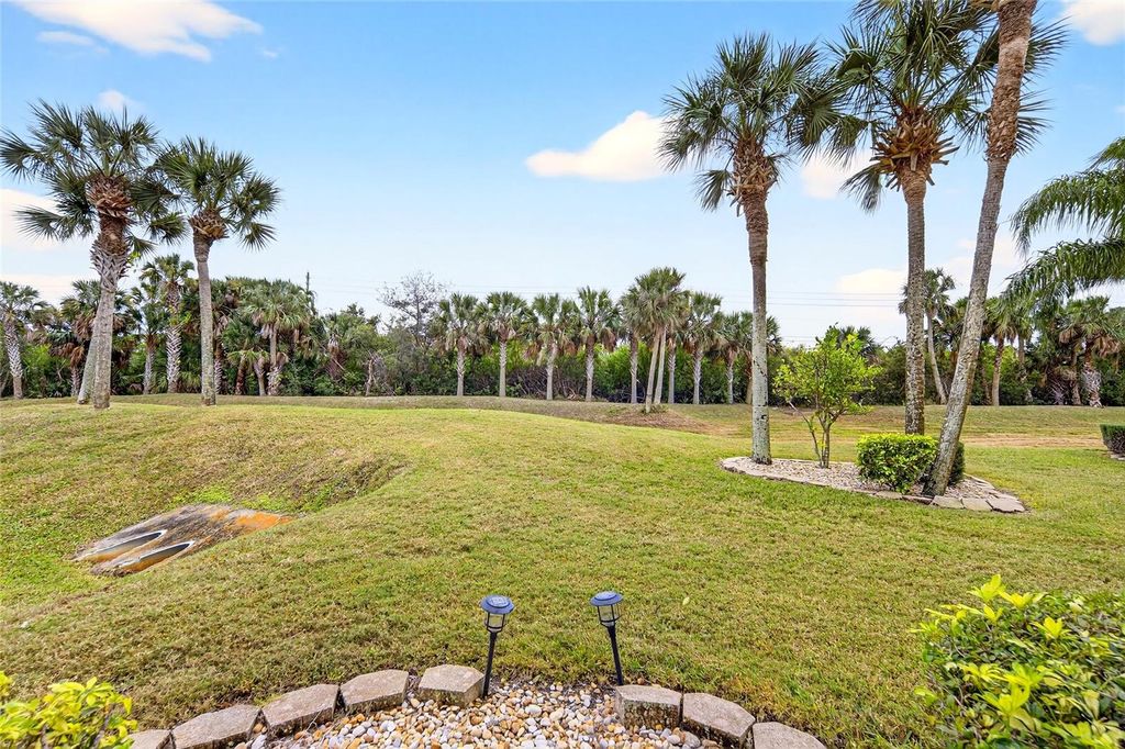 Photo of 420 Bouchelle Drive #101, New Smyrna Beach, FL 32169 (MLS # OM716466)