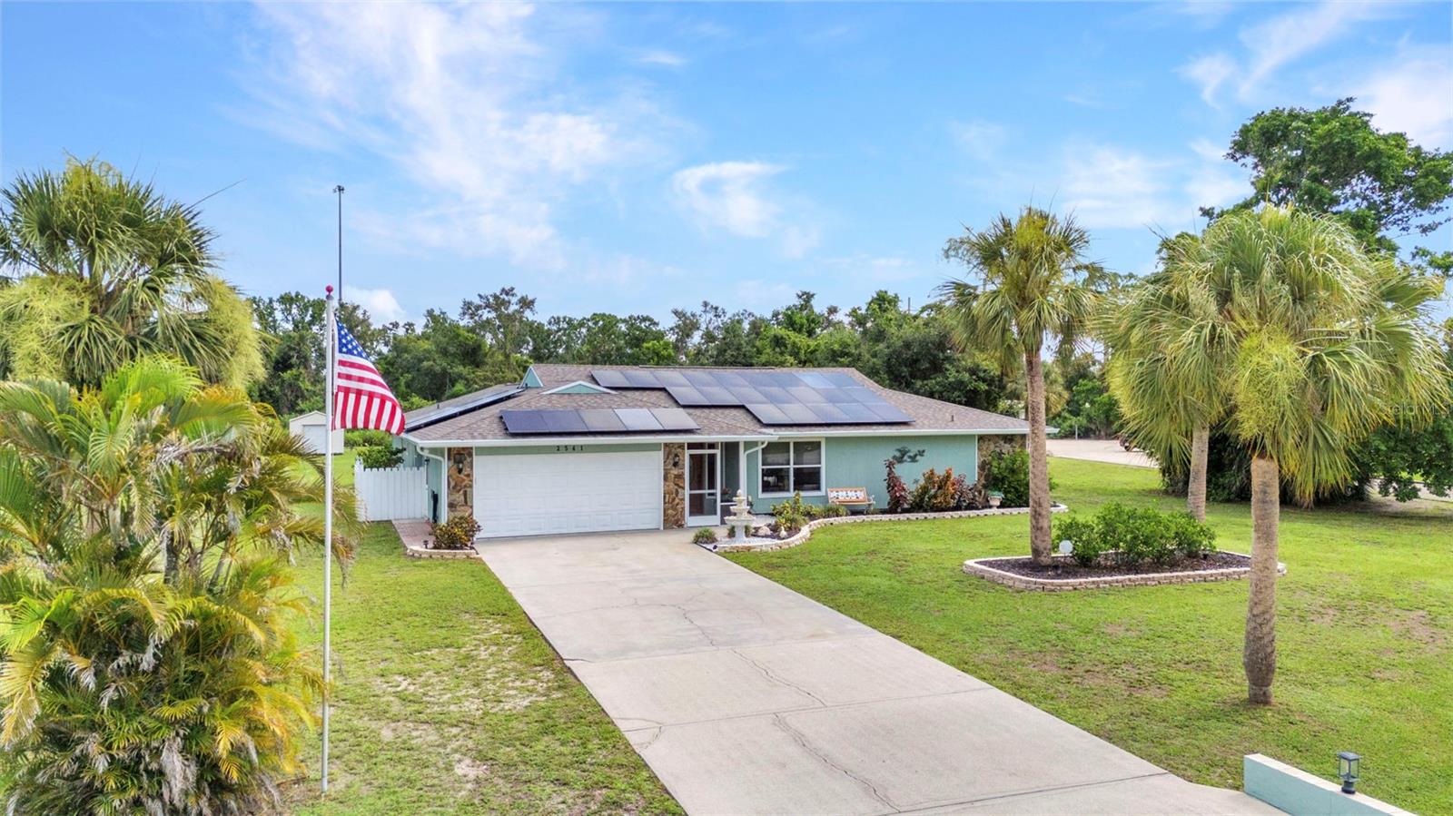 Welcome to this spacious 5-bedroom, 3-bath pool home nestled on a generous 1.22-acre lot in the sought-after community of Venice Acres. Super clean and move-in ready, this one family owned home offers abundant space both inside and out—perfect for those seeking extra land and privacy. Enjoy the flexibility of two en-suite bedrooms, providing private retreats for family or guests. The main living areas feature updated luxury vinyl plank flooring for a modern look that’s also easy to maintain. The inviting family room includes a cozy wood-burning fireplace and sliding glass doors leading to the expansive covered lanai and pool area, beautifully accented with stylish patio pavers. Energy efficiency is a standout feature, with the owned photovoltaic (PV) solar panels that convey with the sale, helping to keep electric bills low saving hundreds of dollars a year. Outdoor living is truly exceptional thanks to the 18 x 12 deck just beyond the pool cage—ideal for barbecues and entertaining larger gatherings. Additional highlights include a 12 x 24 shed equipped with electricity, perfect for storage or a workshop, newer refrigerator, and a whole-home Culligan water filtration system for peace of mind. Need to hook up an RV? There is a 30 amp outlet conveniently located. The home’s NEW ROOF (2023) adds even more value and security. NO CDD FEES, super low HOA fees at just $565 a year, and in an X flood zone so no flood insurance required with most lenders. Just a short drive to the beautiful beaches along the Gulf, downtown Venice with so many boutique shops and cafe style dining, the expanding Wellen Park area, and just under 4 miles to the new state-of-the-art Sarasota Memorial Hospital with quick easy access onto I-75. This is a rare opportunity to own a spacious pool home on acreage in a prime Venice location—come see all that this property has to offer!