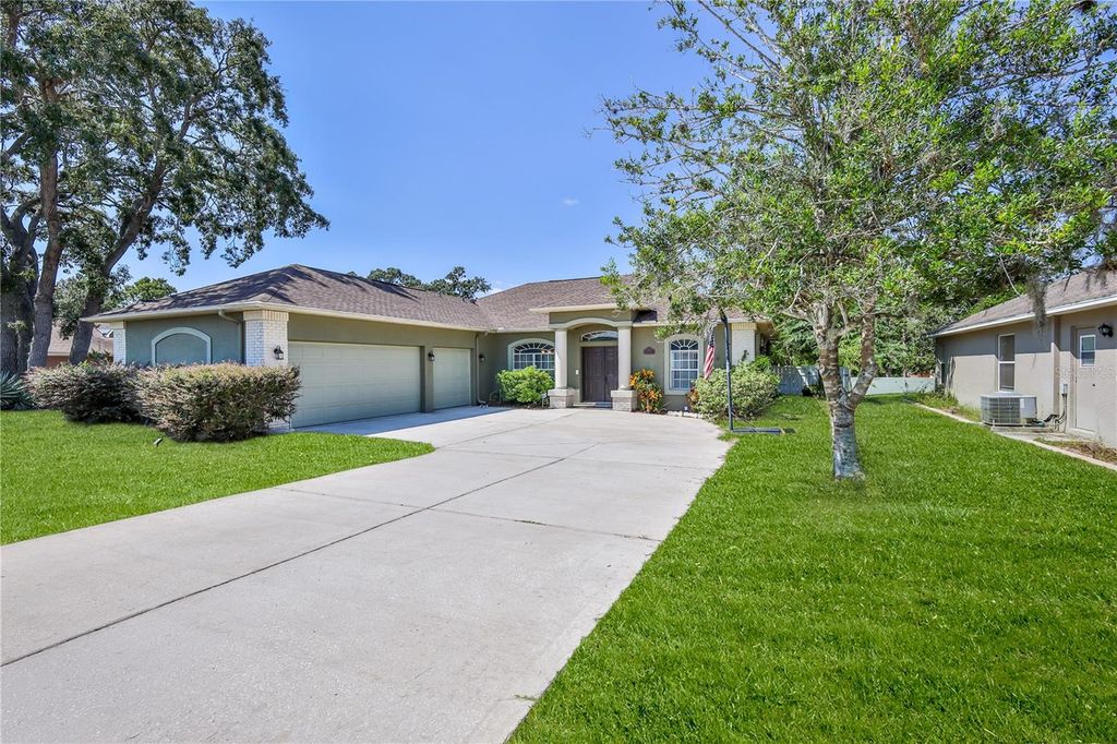 Photo of 1201 Overland Drive, Spring Hill, FL 34608 (MLS # W7879035)