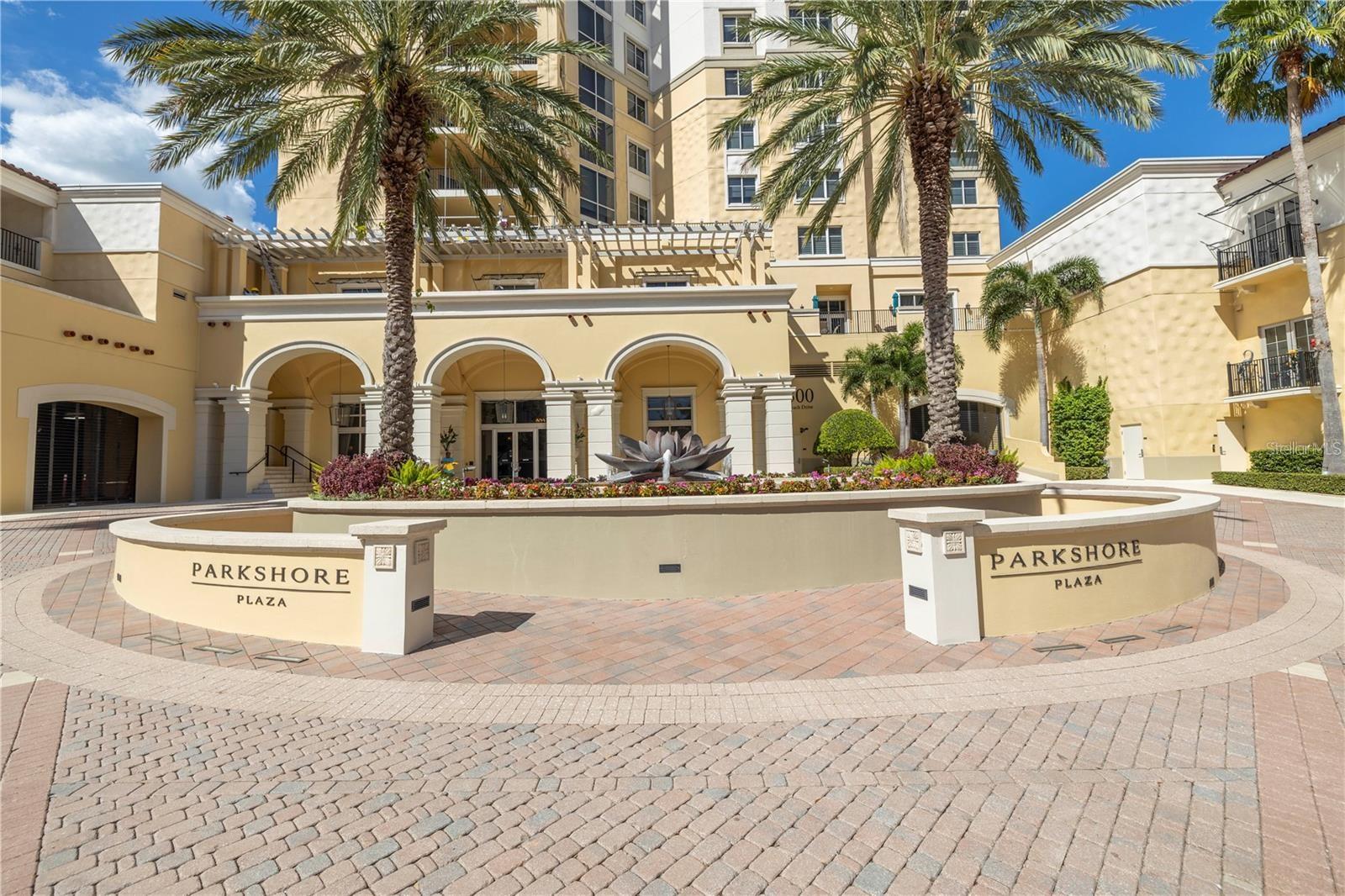 Luxury Living at its finest can be found in this corner unit at the Parkshore Plaza Condominium. Located in the heart of downtown St Pete and Beach Drive. Enjoy skyline and water views from this stunning 23rd floor condo. The Vinoy resort, Tampa Bay and even the downtown Tampa skyline can be seen just sitting in your living space. Your balcony provides a direct view for watching the fireworks on the 4th of July and New Year's Eve. The living areas are enhanced by open-floor plans, floor to ceiling water views and a large kitchen with water views. There is space to have a breakfast table for your casual dining. For formal entertainment, the dining/flex space can be used for an office or library. The spacious primary suite has access to the covered balcony through sliding doors allowing natural light, stunning water views and city lights to flow through the bedroom. There are two walk-in closets, a primary bath with two vanities, a shower and separate soaking tub for your enjoyment. Your key FOB, allows you to enter your private vestibule, inside storage unit and both garage parking spaces. Parkshore offers 24/7 concierge service and exceptional building amenities including: resort style heated pool & hot tub, outdoor kitchen with wrap-around seating, 2 barbecue stations, fireplace, well equipped gym with adjoining men/women’s locker rooms, saunas, billiards room, library, business center, conference room and a social room with catering kitchen. Enjoy the downtown living experience in this luxury building. Walk out and be steps away from dining, shopping, parks, walking/biking trails, waterfront, New Pier and so much more!