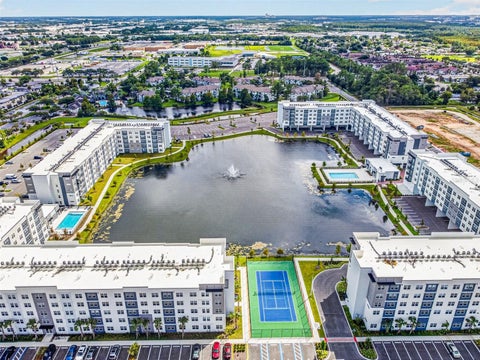 Photo of 5563 Millenia Park Blvd #503, Orlando, FL 32839 (MLS # O6446027)