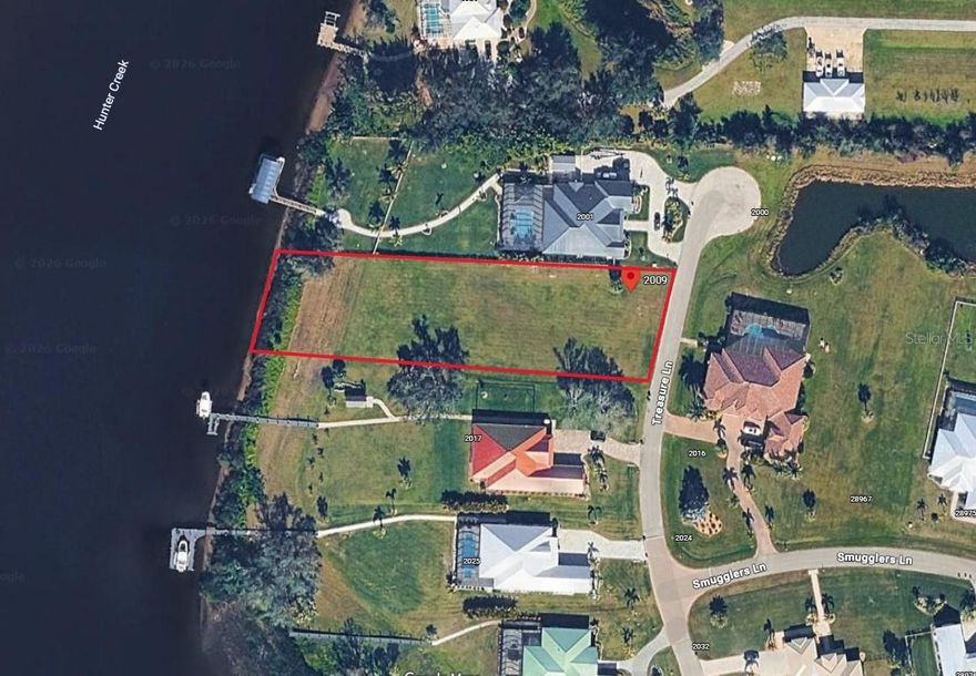 Own Your Slice of Waterfront Paradise in Punta Gorda! Seize the opportunity to own this stunning 1.03-acre waterfront lot in the highly sought-after Estates on Peace River, a private gated luxury community nestled between Fort Myers and Sarasota in scenic Southwest Florida. This extra-large homesite boasts 120 feet of water frontage, public water and sewer, and quick Gulf access with only two 40+ ft. bridges along the way. Situated on a quiet cul-de-sac surrounded by premium homes, the lot offers privacy, tranquility, and serene waterfront living. According to county records, no scrub jays are present on the lot at the time of listing. Residents enjoy assigned private boat docks on the Peace River, a community boat launch, and a tiki hut pavilion overlooking the river, perfect for gatherings or quiet relaxation. Homesites in this exclusive enclave are oversized, offering direct deep-water access, while custom homes feature modern coastal, Old Florida, or Mediterranean architecture with 3–4+ bedrooms, 3+ baths, private pools, and expansive lanais. Enjoy boating, fishing, and waterfront living while remaining just minutes from downtown Punta Gorda, shopping, schools, parks, churches, and I-75. With low HOA fees and a peaceful, exclusive setting, this is a rare opportunity to build your dream home on the Peace River.