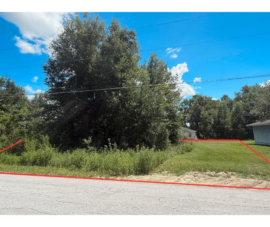 Don’t miss this opportunity to own a fantastic lot in a growing area of Ocala Ridge! The community is located at the intersection of SR 40 and NW 60th, this buildable lot sits on a paved road surrounded by multiple new homes, offering strong potential for future value. Enjoy a convenient location just minutes from the World Equestrian Center and I-75. Shopping, dining, and amenities are close by, with SR 200 only a short drive away. Ocala’s central location makes it easy to enjoy Florida’s natural beauty—you're just 1 hour and 30 minutes from the beach and within easy reach of local springs, lakes, and fishing spots throughout Marion County. Zoned for residential use, duplexes are permitted with county approval—perfect for investors or those looking to build a primary home with added income potential. Act now and build your dream or investment in one of Ocala’s rapidly developing neighborhoods!