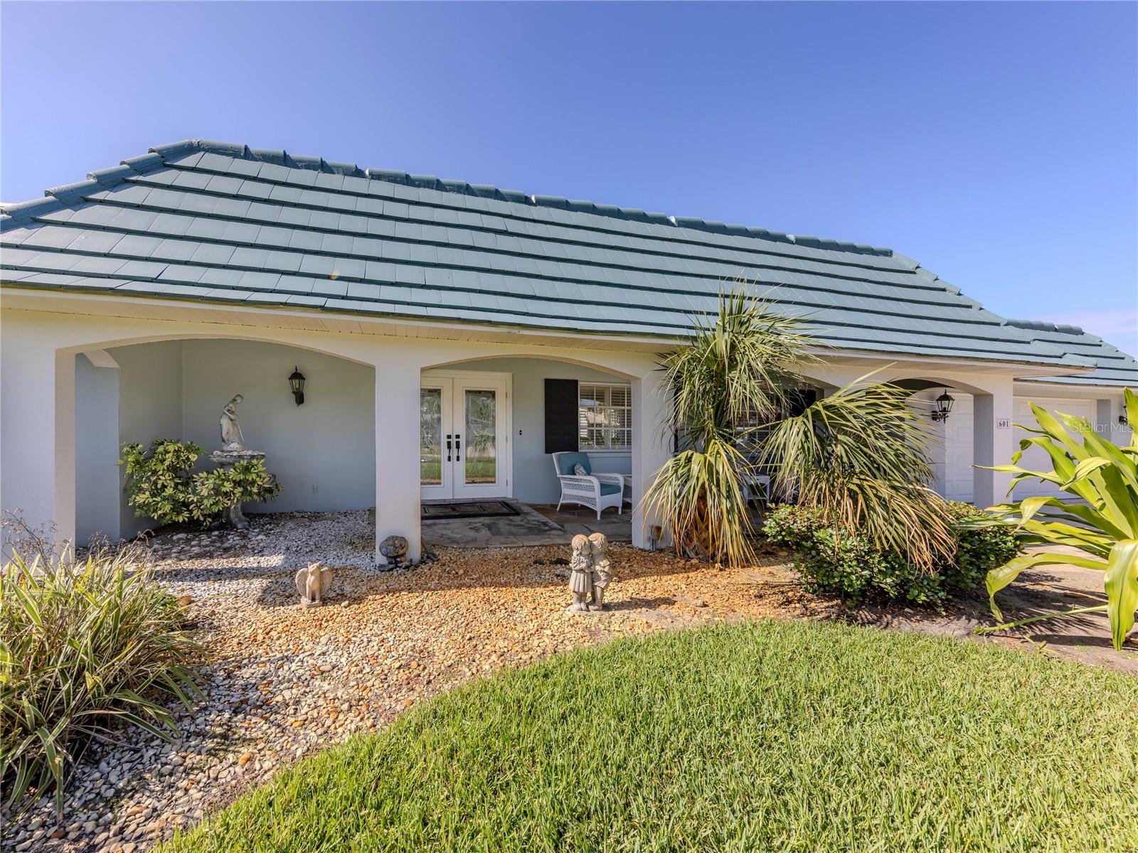 Lovely Venice Island home located W of 41 between the beach and downtown! Includes mother-in-law suite. Spacious 3 bedroom plus den pool home has been lovingly maintained and lends itself perfectly to entertaining, family get-togethers and the Venice-style life in Paradise. Remodeled Master Bath with lg soaking tub, walk-in shower and double sinks. Tiled throughout, most rooms open onto the 38-foot caged lanai and heated pool. 2 bedrooms and the den are in one wing with MASTER SUITE on the opposite side of house. Inside laundry, Microwave, clothes washer and clothes dryer about six months old. All other appliances about three years old. The sunny open kitchen is the heart of the home, with one full wall of sliding glass pass-thru windows, miles of counter space, a casual dining area and comfy seating. Oversized laundry room contains oversize storage. The 2-plus car garage has new wind-resistant overhead door. Don't miss this excellent Island opportunity! Furniture available.
