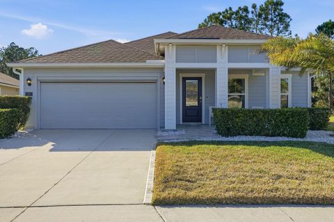 Photo of 73 Lob Wedge Lane, Bunnell, FL 32110 (MLS # V4947079)