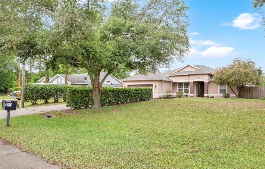 Welcome to this beautiful 4-bedroom, 2-bathroom home situated on an oversized lot just shy of half an acre. Nestled among lush, mature trees and no HOA.  NEW ROOF, NEW AC, NEW TANKLESS HOT WATER HEATER.  Step inside to discover tall ceilings that create an open, airy feel throughout with a split floorplan leaving plenty of space for entertaining.  Outdoors, enjoy your own private oasis with a screened-in pool—ideal for relaxing weekends or hosting gatherings year-round. The expansive yard offers endless possibilities for gardening, recreation, or even future expansion.  Located in a highly desirable area with access to top-rated school districts.  Don’t miss the opportunity to own a spacious, serene retreat with all the features you’ve been searching for.  Receive $3000 toward closing for using sellers preferred lender (FLORIDA MORTGAGE BROKERAGE)