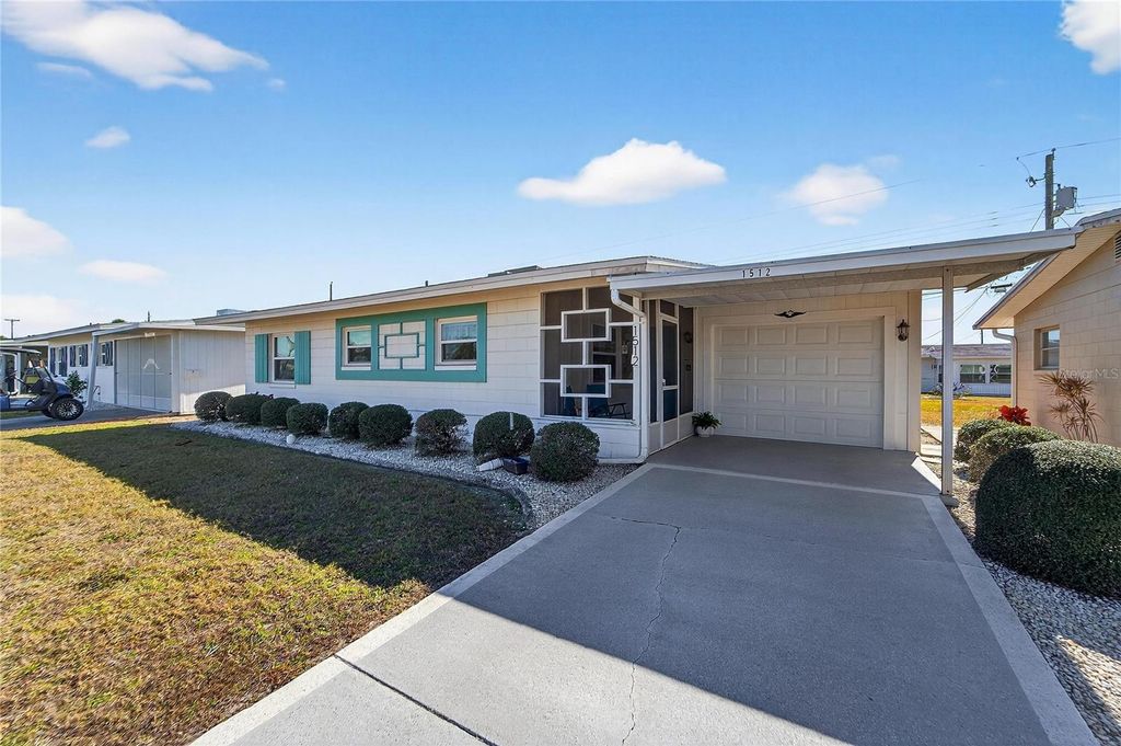 Photo of 1512 Chevy Chase Drive, Sun City Center, FL 33573 (MLS # TB8466953)