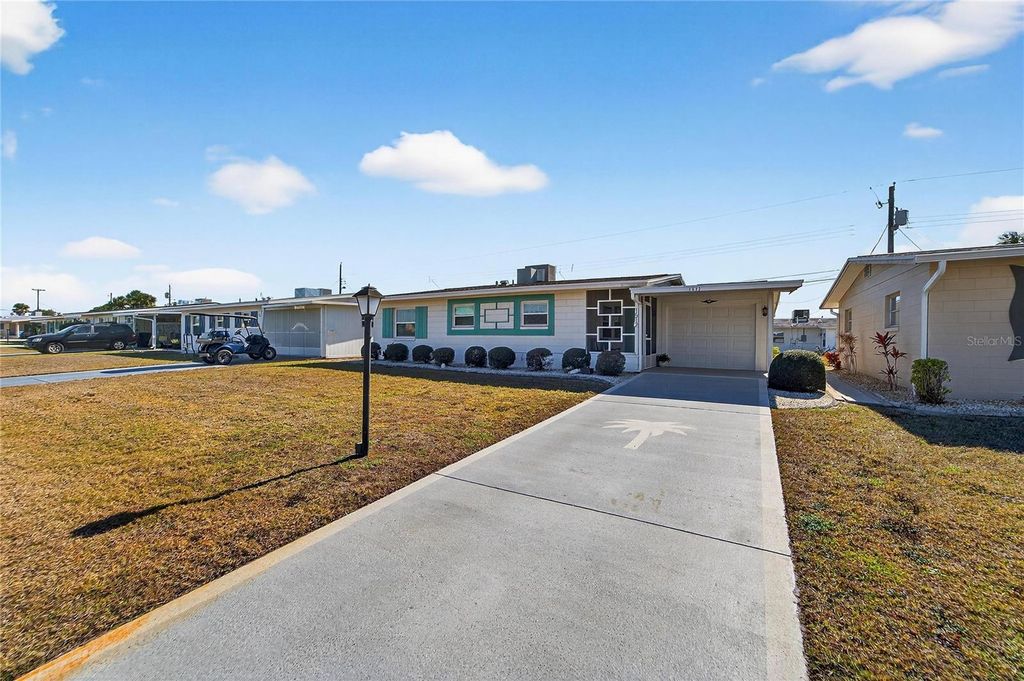 Photo of 1512 Chevy Chase Drive, Sun City Center, FL 33573 (MLS # TB8466953)