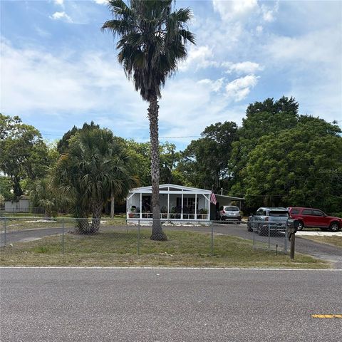 Photo of 13139 Hicks Road, Hudson, FL 34669 (MLS # TB8498925)