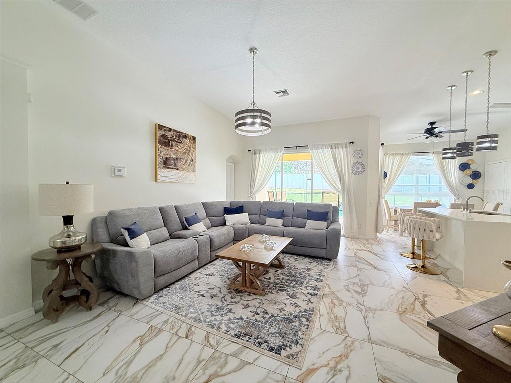 Photo of 2213 Wyndham Palms Way, Kissimmee, FL 34747 (MLS # O6388889)