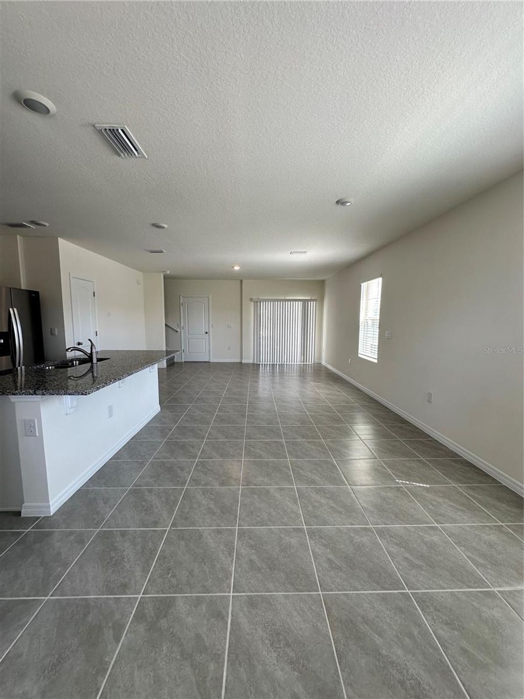 Photo of 1767 Mccoy Lane, Kissimmee, FL 34744 (MLS # O6356828)