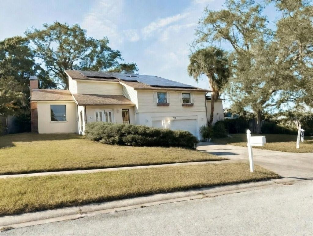 Photo of 628 Timber Lane, Tarpon Springs, FL 34689 (MLS # TB8432540)
