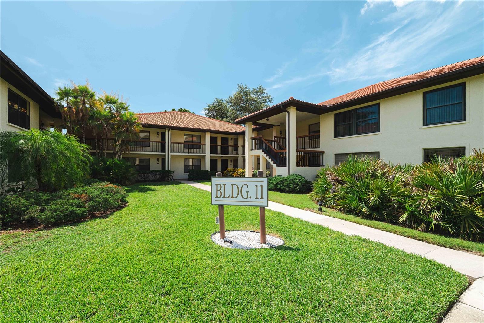 Investor-friendly 2 bed, 2 bath condo in the gated Hammock Pine Village community! This 2nd-floor unit offers 1,030 sq ft of bright living space, vaulted ceilings, and a screened-in lanai with serene views. The open-concept living/dining area flows into a functional kitchen with wood cabinetry. A long-term tenant is in place through January 2026, making this a turn-key investment opportunity. Conveniently located near shopping, restaurants, and major thoroughfares. Community features include a pool, tennis courts, and mature landscaping. Don?t miss this ideal Clearwater income property!