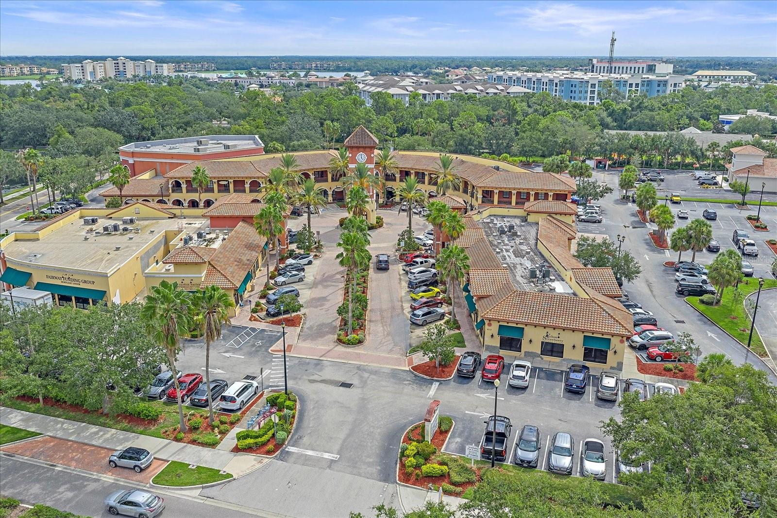 Retail or Office condominium suite available in the highly desirable San Marco Plaza in Lakewood Ranch. Conveniently located on the 2nd floor next to the elevator, the space's finishes are beautiful and currently built out as a fitness studio and is well-suited for a physical therapist, Pilates or yoga studio, massage therapist, or personal training facility.
The functional layout features a spacious open area, two private offices or treatment rooms, two private restrooms, a laundry area, and a private outdoor terrace. With the simple addition of a few interior walls, the suite can also be easily adapted for a professional office environment.