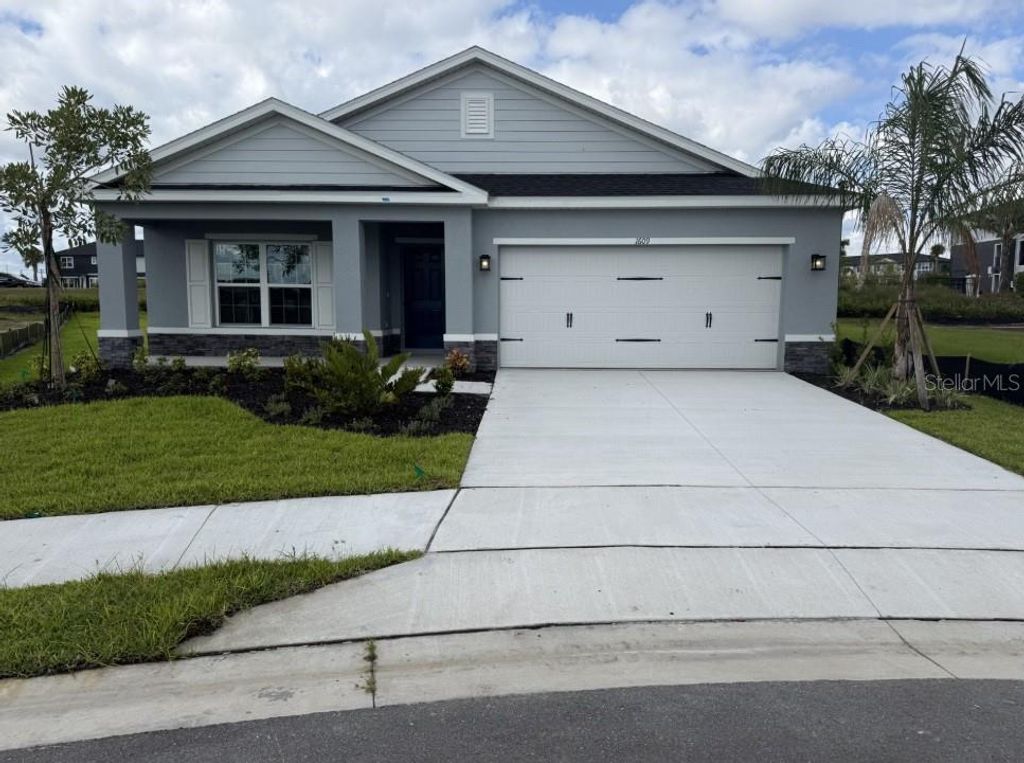 Photo of 1609 Starling Song Lane, Lakeland, FL 33811 (MLS # W7879434)