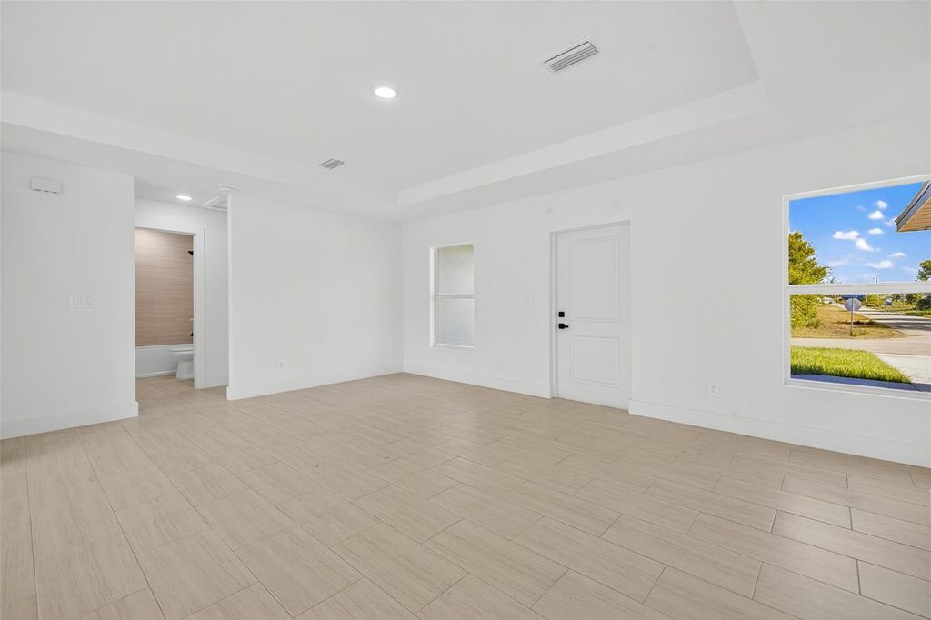 Photo of 884 Chemstrand Street E, Lehigh Acres, FL 33974 (MLS # O6350788)