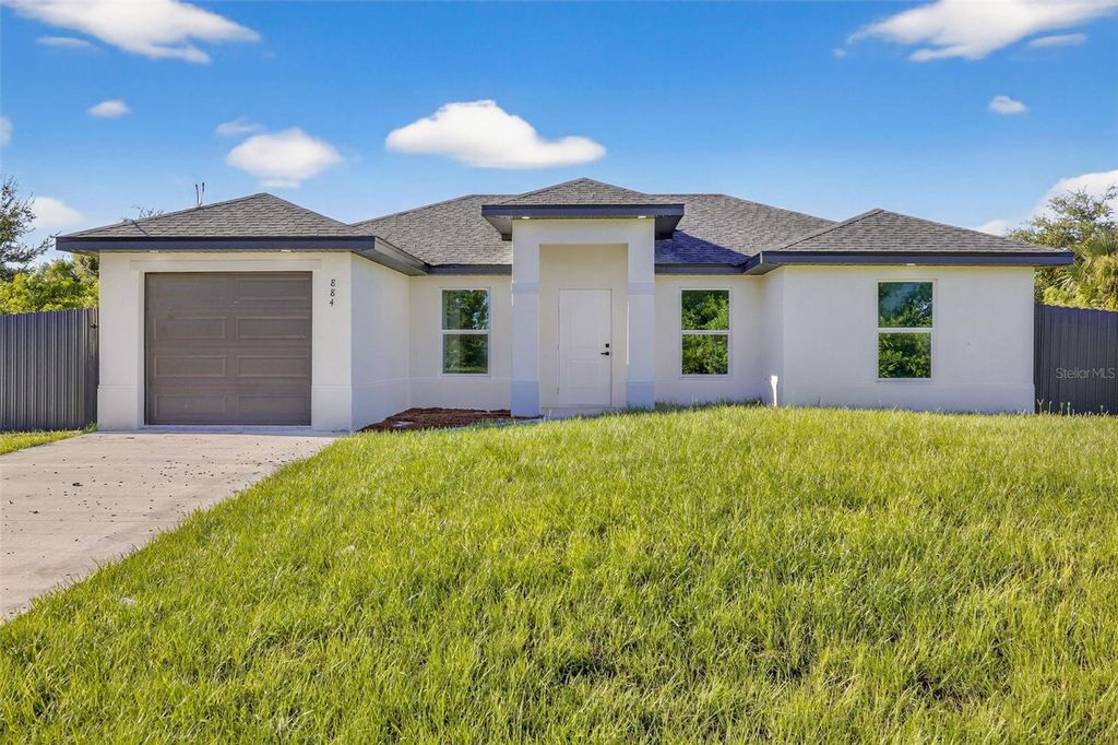Photo of 884 Chemstrand Street E, Lehigh Acres, FL 33974 (MLS # O6350788)