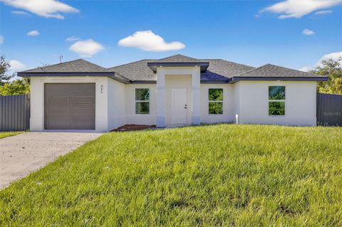 Photo of 884 Chemstrand Street E, Lehigh Acres, FL 33974 (MLS # O6350788)
