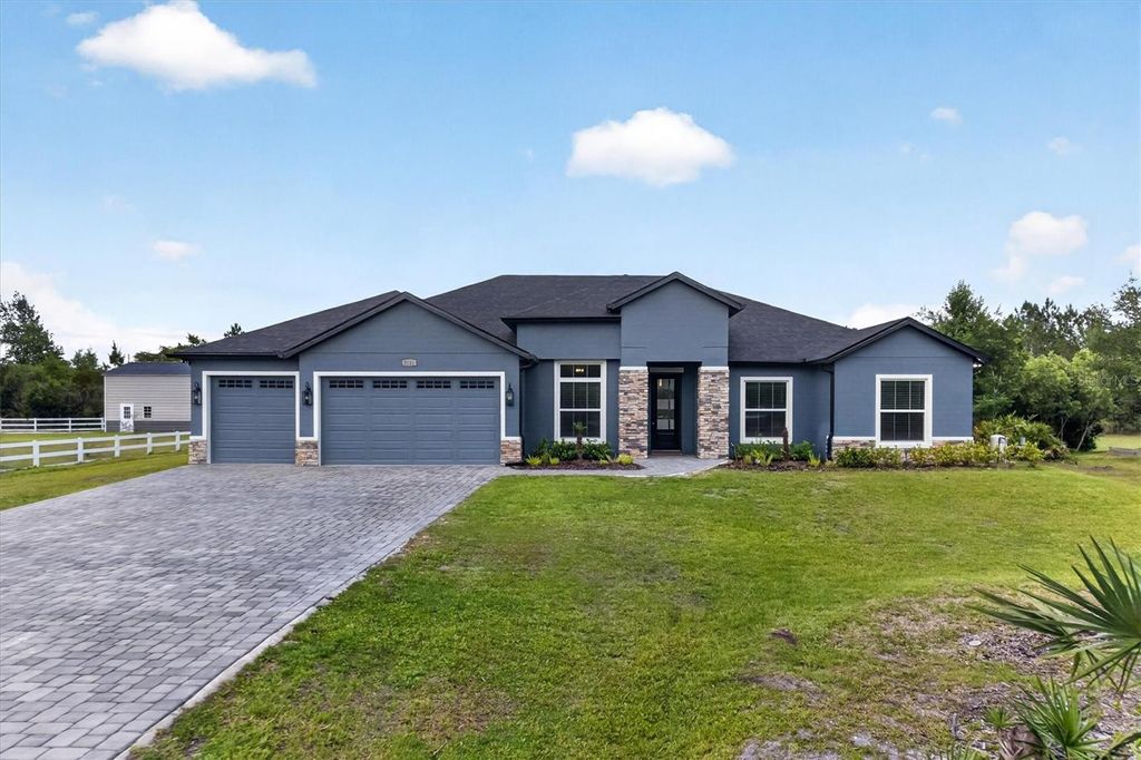 Photo of 3115 Cavalier Avenue, Orlando, FL 32833 (MLS # O6409759)
