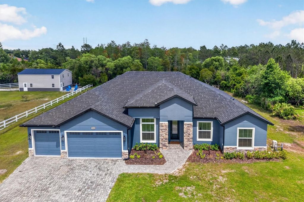 Photo of 3115 Cavalier Avenue, Orlando, FL 32833 (MLS # O6409759)