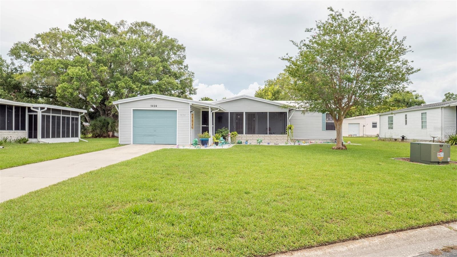 Welcome to your dream home in the charming town of Spring Hill, FL! This beautiful mobile property boasts 3 spacious bedrooms and 2 modern bathrooms, perfect for those who love to entertain. With 1151 living square feet, there is plenty of room for everyone to spread out and relax. The attached 1-car garage provides convenient parking and storage space. Step inside and be greeted by brand new floors that add a touch of elegance to the home. Located in a peaceful neighborhood, you can enjoy the tranquility of suburban living while still being close to all the amenities Spring Hill has to offer such as Hernando Beach. Don't miss out on the opportunity to make this house your forever home. Schedule a showing today!