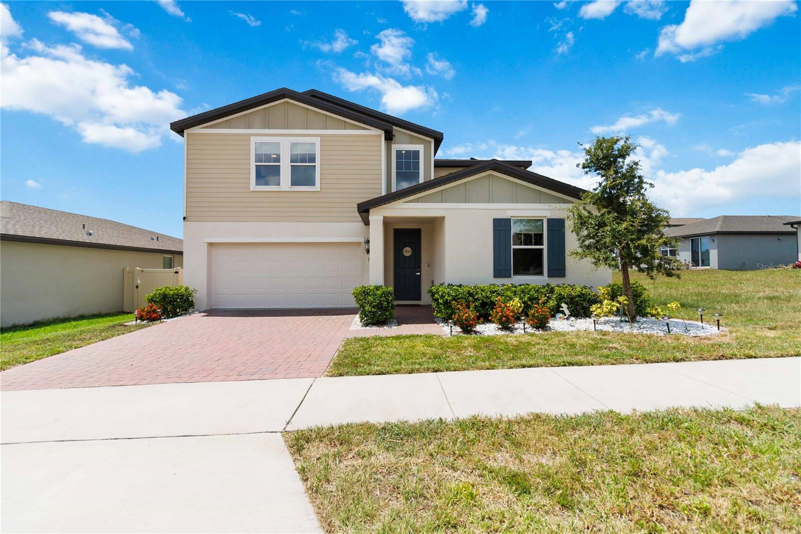 Welcome to this beautiful and spacious 4-bedroom, 3-bathroom POOL HOME, featuring a thoughtfully designed layout for modern living. With one full bathroom and a flexible multi-purpose room on the main floor, and two additional bathrooms and another versatile space upstairs, this home offers incredible adaptability. Enjoy the bright and airy feel with natural light, modern finishes and tile flooring in the main living spaces. Spacious eat-in kitchen with oversized island with seating, stone countertops and SS appliances. The separate upstairs and downstairs living areas provide both comfort and privacy for everyone. Outside, a sparkling screened-in saltwater pool is ready for immediate enjoyment. This home also includes a 2-car garage, solar panels, and a Murphy bed that conveys in the guest room. Citrus Landing is a great place to call home with easy access to top-rated schools, excellent nearby amenities, parks, shopping, dining and more. Tour today!