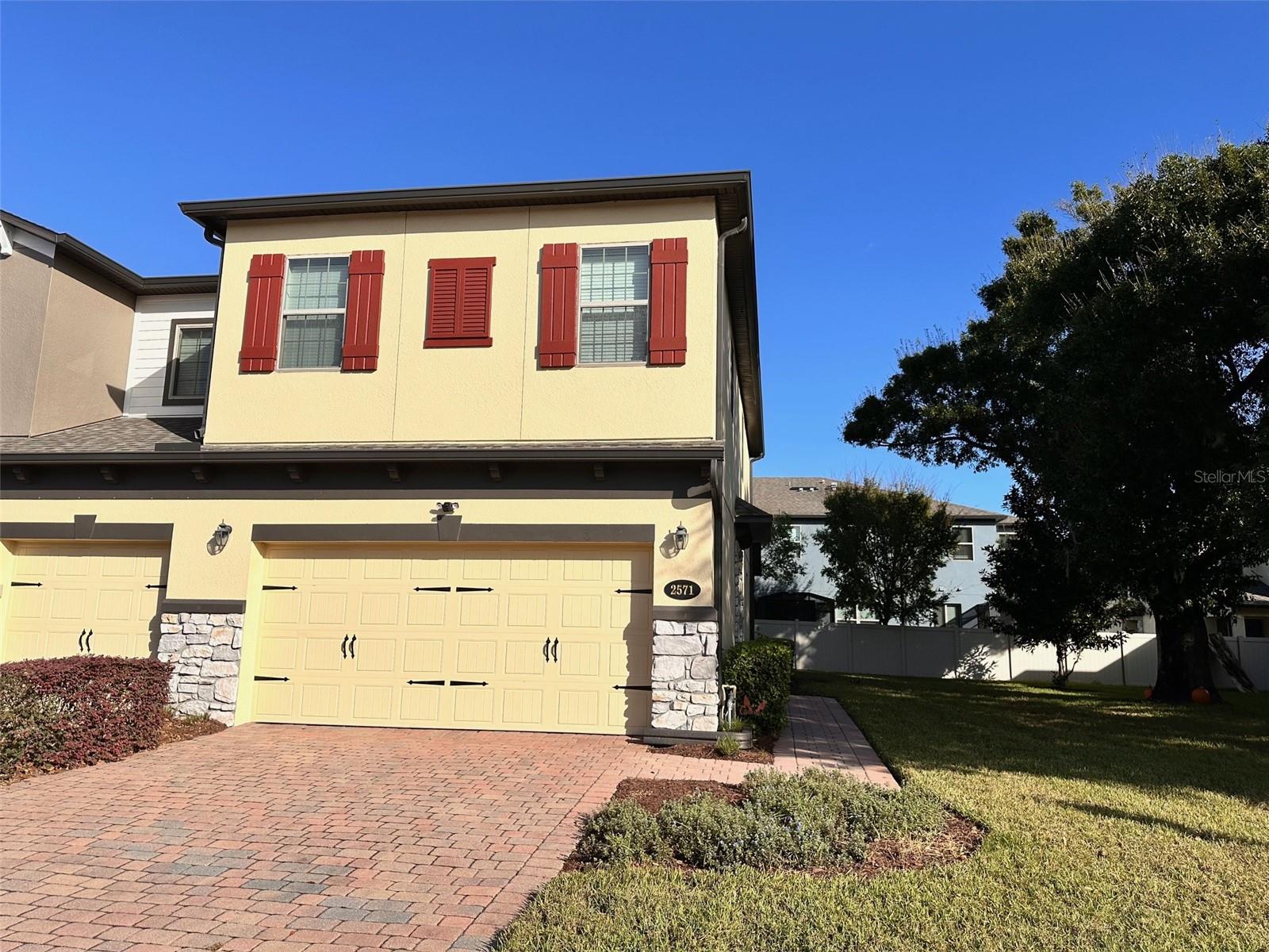 Econ Landing is conveniently located in East Orlando. Only 15 minutes from the Orlando International Airport, 35 minutes from Disney and 60 minutes from the Beaches. The 32825 Zip code is one of the most desirable locations to live in Central Florida. Built in 2018 by MI Homes, the San Mateo Model is a thoughtfully designed townhome floorplan featuring 3 Bedrooms, 2.5 Baths and a 2 Car garage. Located at the end of the townhome building with only one neighbor and a wide open lush, grassy area. A premium lot! The first floor of this home features an open concept great room/kitchen combo and a powder bath. There is a large sliding glass door leading to a covered Lanai for entertaining outdoors. The second floor features additional living space at the loft, 2 bedrooms in the rear that share a full bath, a laundry room is upstairs with a door. The spacious owners retreat has a huge walk-in closet and a luxurious private bath with dual sinks, garden bath with a separate shower, linen storage and linen closet