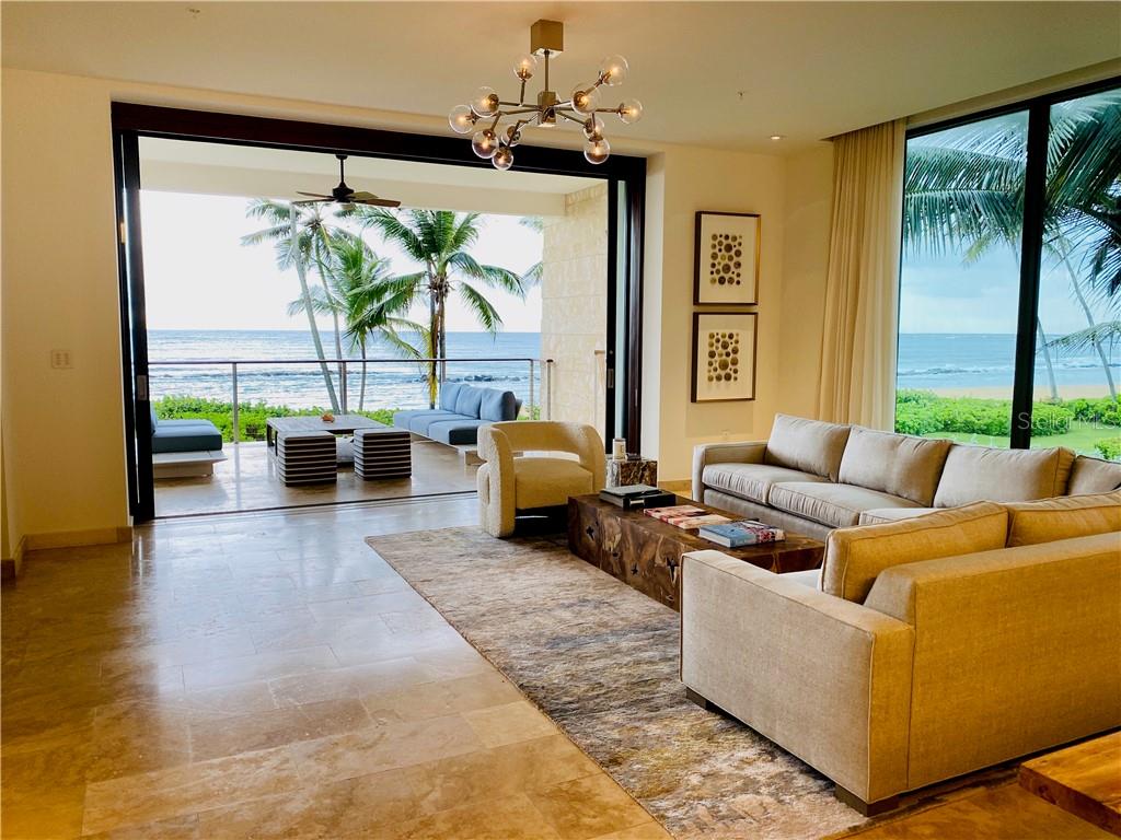 Walk from the privacy of your residence directly to the beach. Enjoy breathtaking ocean views from your bedroom and living room. Watch daily beautiful sunsets from your private terrace.
Welcome to West Beach #3522/23, a Dorado Beach Ritz-Carlton Reserve Beachfront Residence. Indulge in the luxury lifestyle that this renowned world class resort offers. As a homeowner you enjoy all of the resort’s amenities with exclusive concierge service and a la carte services.
Residence features 3 bedrooms, 3.5 bathrooms with 2 outdoor showers and a media room. Property has 3,056 interior square feet and a total of 4,085 square feet including the 2 terraces and 2 golf cart parking spaces.
This extraordinary ocean-front residence is being sold as is, fully furnished (artwork excluded) and it comes with 2 golf carts.
Make this your dream home today!