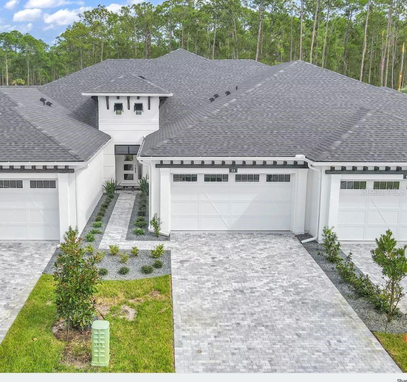 NEW PHASE! MOVE IN READY! The Blossom II is a two-story townhome with 3 bedrooms and 3 bathrooms blending comfort with sophistication. Beautiful lake front location! The open first floor distinctively separates the space with a well-appointed kitchen open to the dining and living rooms. Upstairs, you will find a generous size bonus room with tray ceiling and an additional bedroom with walk in closet plus full bath. The Blossom II is not just a home but a place for cherished memories. Features include deluxe kitchen, 10' ceilings, tray ceilings, open plan, screened and covered lanai, paver drive and much more! Sub. Assoc. of 264/month includes, internet, Hotwire Access TV package, lawn, irrigation maintenance & roof. BRAND NEW STATE OF THE ART CLUBHOUSE NOW OPEN! PICTURES ARE OF A FURNISHED MODEL AND NOT ACTUAL HOME. HBW Home Warranty included. Substantial discounts to the club if buyer joins within 30 days of closing.