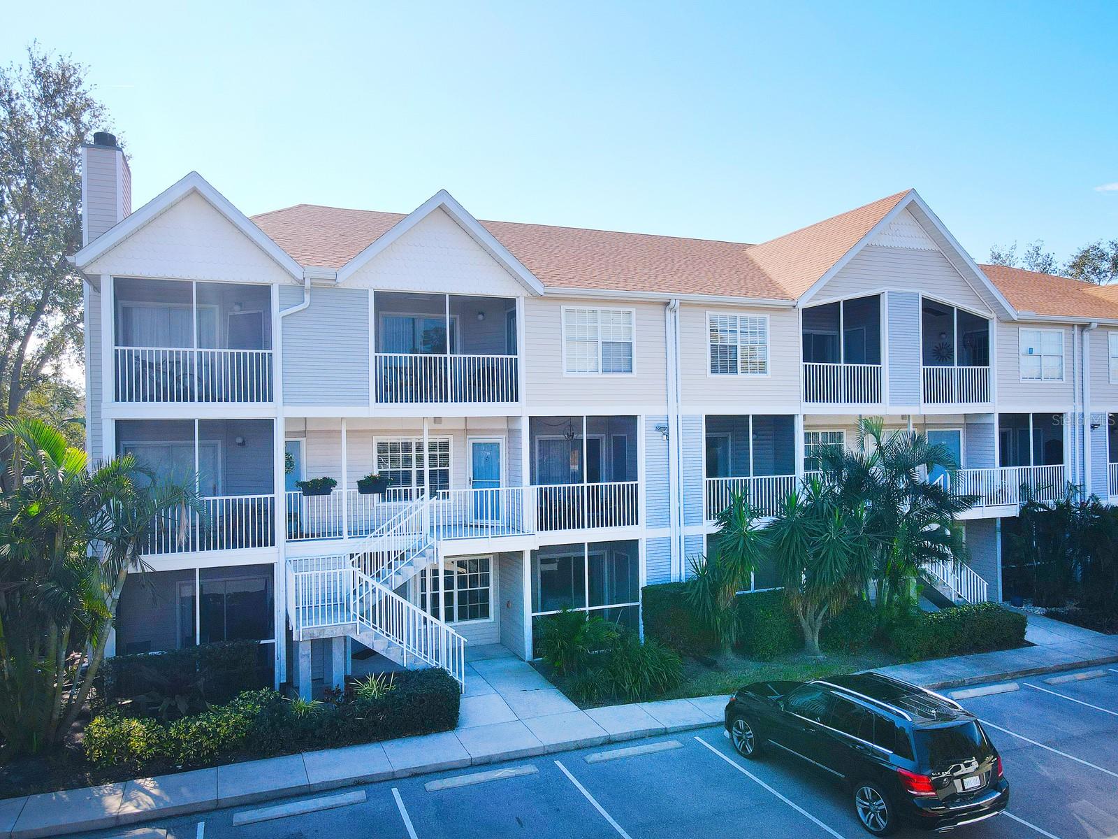 AS PROMISED! This Central Park townhome is lcoated close to all that Sarasota has for anyone. Approximately 1/2 mile to Sarasota Bay and Marina Jack, downtown and just a short distance to St. Armand's Circle and Lido Beach. Right across the street from a Publix grocery store, and only 2 blocks from Marie Selby Botanical Gardens and offereing easy access to Sarasota/Bradenton International Airport. And, less than a mile to Sarasota Memorial Hospital. Enjoy fine dining, theaters, the opera, Van Wezel Performing Arts Center, the Sarasota Ballet and much more that are so close. This 2-story townhome is priced to allow a buyer the opportunity to update to fit their lifestyle. The main floor has an open floor plan with living room, dining area and open kitchen along with a screened lanai with a small storage room. It also has a stack-unit washer and dryer and a guest powder room. In addition, there is under stair lighted storage measuring approximately 8 feet by 3 feet which could easily hold a small desk if needed. The two ensuite bedrooms are upstairs and both have access to the upper level screened lanai (also with a small storage room). The master bedroom has a walk-in closet and sliding doors to the lanai while the guest bedroom has a french door to the lanai. Both bedrooms have their own bathroom, which is a perfect set-up for roommmates or guests. Both baths have bathtubs with showers. Central Park 2 offers a community pool, tennis/pickleball courts, hot tub, and a clubhouse with a fitness center and library along with professional management. A community day dock offers a kayak launch for residents which leasds you down the bayou to Sarasota Bay. The monthly maintenance fee includes basic cable, high speed internet, water, sewer, exterior building maintenance, grounds and recreational factility maintenance and a reservce fund. The communityis pet friendly and allows owners to have one house pet weighing less than 35 pounds and no larger than 18 inches at the shoulder at maturity. If you are looking for a place in the sun that is a less costly alternative to downtown living, this could be your perfect solution. Ideal for a winter home or investment opportunity for an investment as a rental property.