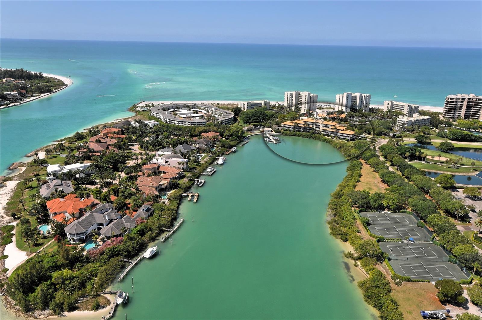 This beautifully remodeled Junior Suite offers peaceful lagoon views and a robust income stream. Sold fully furnished and part of the hotel program, it's a turnkey investment with resort-style perks. Unlike other buildings, this one features Junior Suites with soaring 10-foot ceilings, adding a sense of space and luxury. From your private terrace, watch manatees, dolphins, and a vibrant array of tropical birds glide by. As an owner in the hotel program, you will enjoy access to the exclusive 410-acre Longboat Key Club. Indulge in five upscale restaurants, 45 holes of championship golf, award-winning Tennis Gardens, spa and fitness center, a private white sand beach with umbrellas and waitstaff, and a full-service marina. Recent renovations to the rooms, pool, dining areas, and guest services elevate this already award-winning property, which proudly holds the AAA Four-Diamond Award. Whether for investment or leisure, this is your chance to live the Longboat Life.