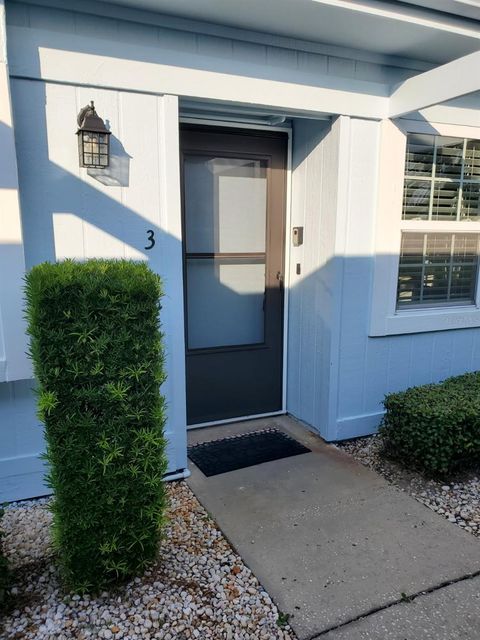 Photo of 11135 Carriage Hill Drive #3, Port Richey, FL 34668 (MLS # TB8532738)