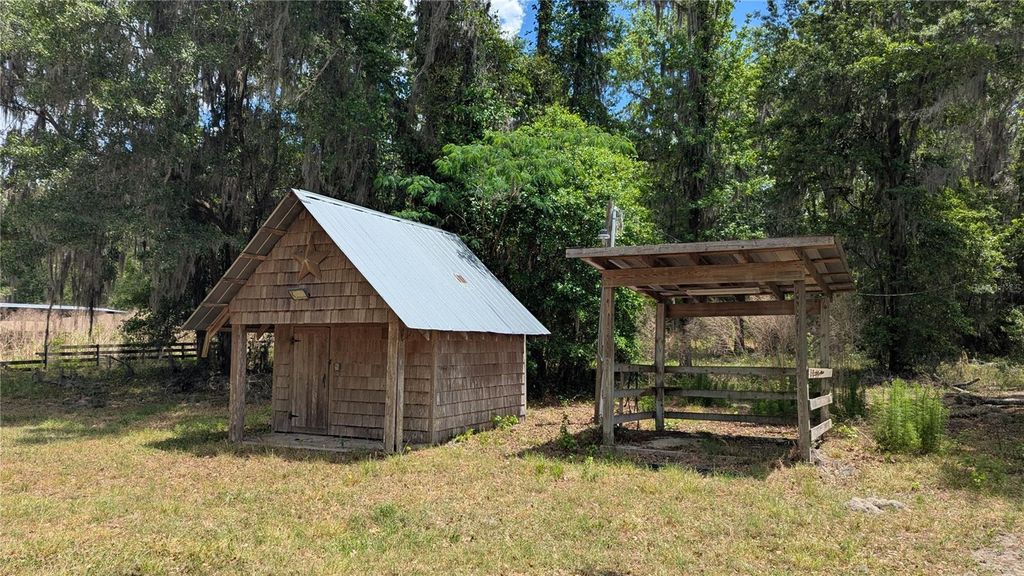 Photo of Tbd NW 71st Terrace, Gainesville, FL 32653 (MLS # GC539736)