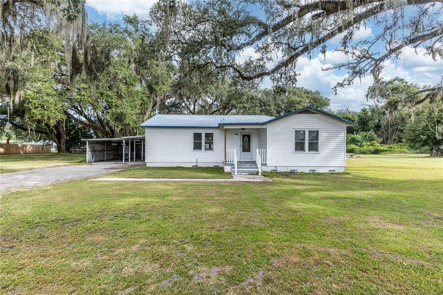 Looking for more space and freedom while staying close to everything? This rare ±0.75-acre property along US Hwy 301 offers the best of both worlds—peaceful country-style living with unbeatable convenience and strong investment potential.The existing 1,200 sq. ft. home features a flexible layout with one bathroom, bright open spaces, and a bonus room that’s perfect for a home office, small business setup, or creative studio. Whether you’re working remotely, running a home-based business, or simply need extra space for kids, hobbies, or guests, this property adapts to your lifestyle.Outside, you’ll find plenty of room to spread out—space for kids to run and play, gardens to grow, and even the option to raise animals like chickens, goats, or family pets. Unlike cookie-cutter neighborhoods, here you have the freedom to create the lifestyle you’ve always wanted.Strategically located just minutes from The Villages’ fastest-growing communities—Fenney, Southern Oaks, and Middleton—you’ll enjoy both a private setting and exposure to a booming market. Quick access to the Florida Turnpike, I-75, and CR 470 makes travel and commuting easy.And if business is on your mind, the property’s direct frontage on high-traffic US Hwy 301 gives you unbeatable visibility. With a zoning change, the home can be converted into a professional office, retail storefront, or another income-producing space—ideal for entrepreneurs who want to combine home and work in one convenient location. Plus, an additional ±0.75 acres is available for purchase, giving you room to expand your footprint for the future.This property is rare because it gives you options: live the homestead lifestyle now, run a small business from home, or plan for long-term commercial use as the area continues to grow.Schedule your private showing today and see how this versatile property can fit your life, your work, and your future.f