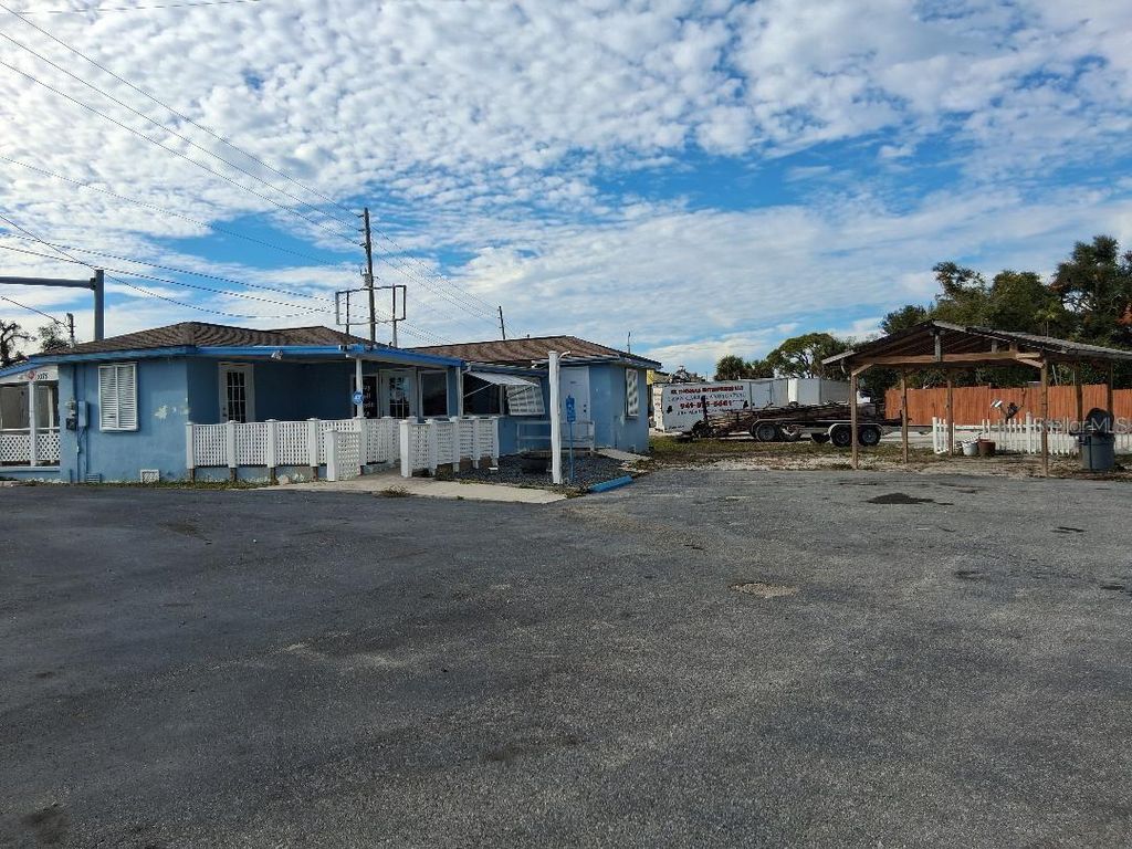 Photo of 1075 S Mccall Road, Englewood, FL 34223 (MLS # D6145401)