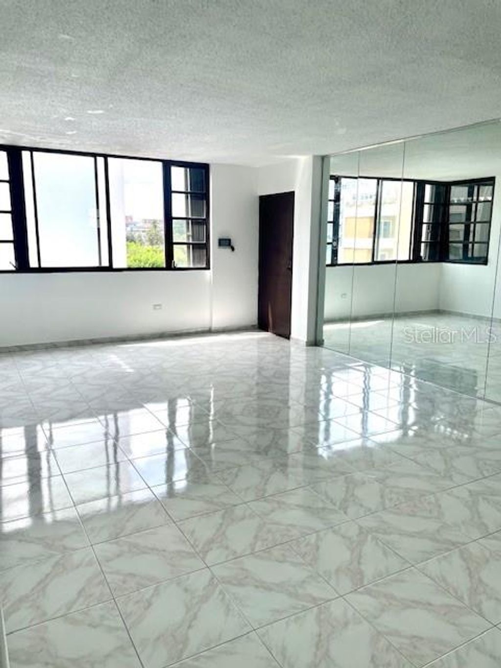 Photo of 18 Marseilles #4B, San Juan, PR 00907 (MLS # PR9119584)