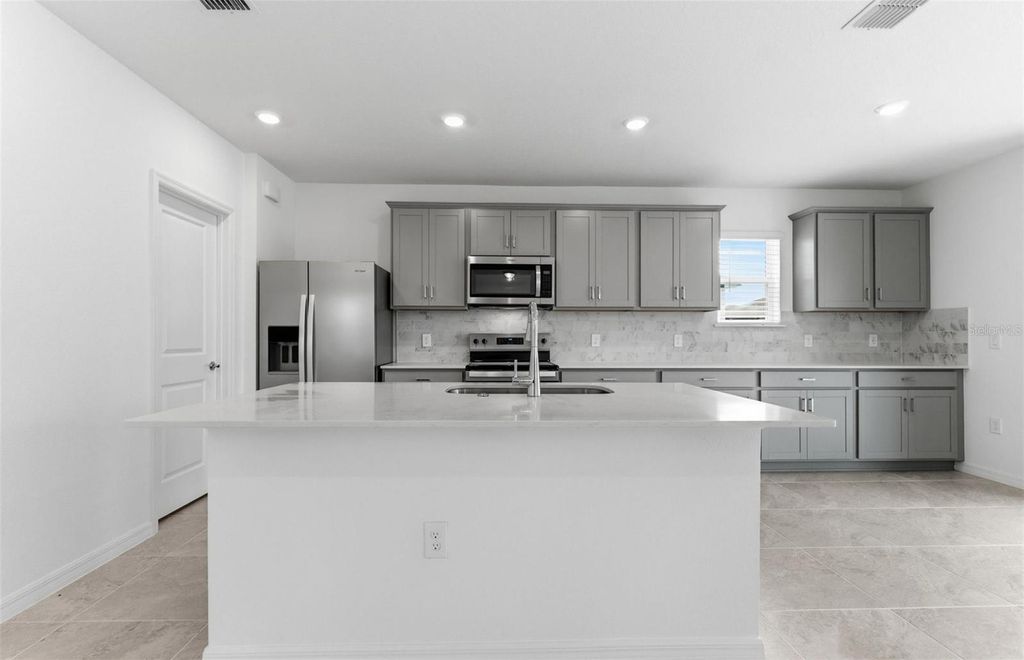 Photo of 1098 Silverlake Boulevard, Lake Alfred, FL 33850 (MLS # TB8449437)