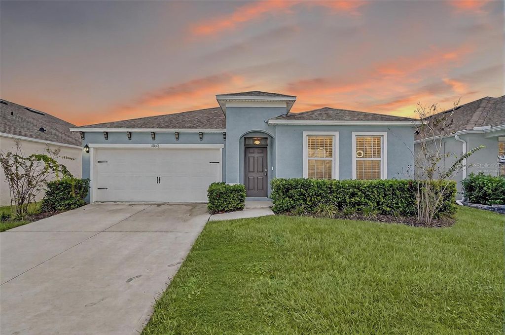 Photo of 28026 Cypress Springs Loop, Okahumpka, FL 34762 (MLS # TB8434792)