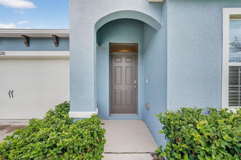 Photo of 28026 Cypress Springs Loop, Okahumpka, FL 34762 (MLS # TB8434792)