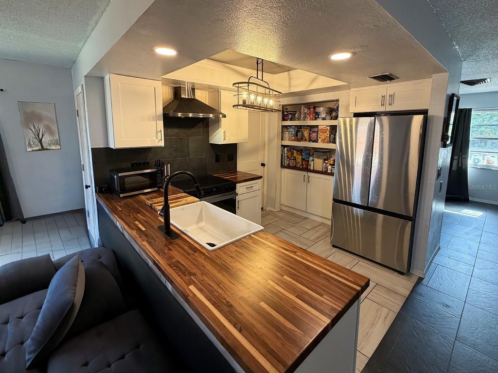 Photo of 8611 Longboat Lane, Hudson, FL 34667 (MLS # TB8454654)