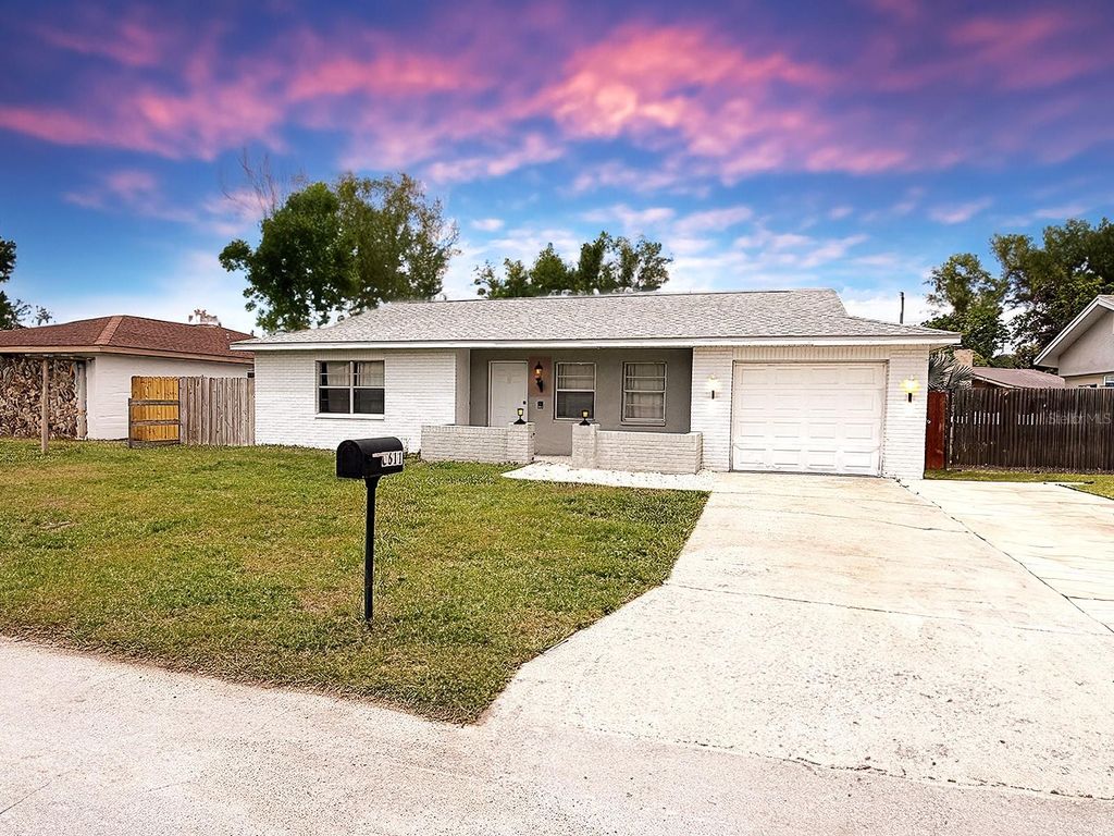 Photo of 8611 Longboat Lane, Hudson, FL 34667 (MLS # TB8454654)