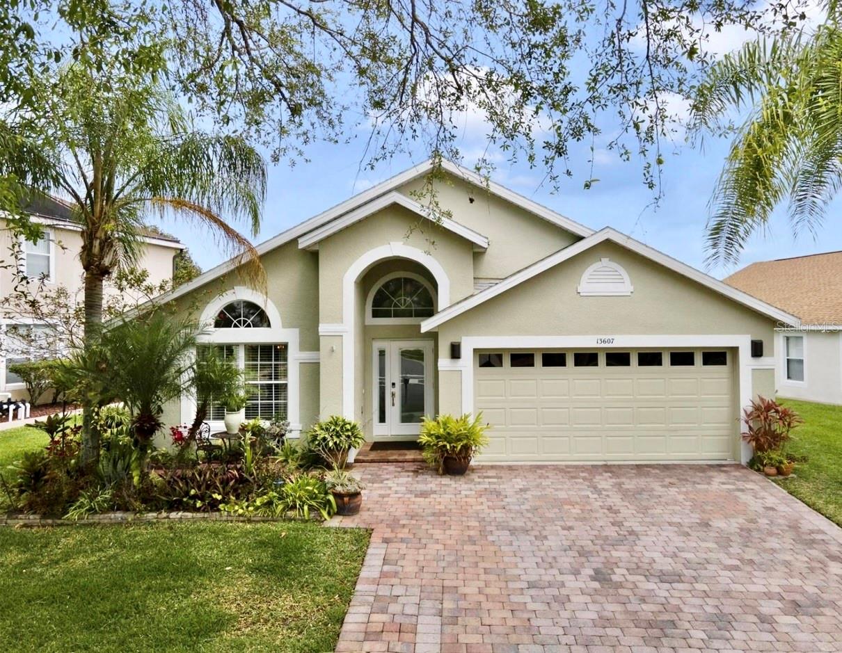 Exceptional community. Offered for rent and move-in ready in the gated golf community of Eagle Creek, this beautifully updated three-bedroom plus flex room home showcases peaceful water views and thoughtful modern upgrades including a brand new roof, a fully remodeled kitchen with new flooring, and a water purification system for everyday peace of mind. Bright, open living areas and fresh finishes create a warm, low-maintenance backdrop where a morning coffee by the window feels like a small luxury and evenings invite relaxed gatherings or quiet downtime; the flexible bonus room adapts easily as a home office, playroom, or guest space to match your needs. The neighborhood amenities read like a staycation with a clubhouse, golf pro shop, lounge and restaurant, tavern, swimming pools, fitness center, tennis and basketball courts, and outdoor Code Playgrounds, so leisure and convenience are just steps away. Location is a true asset, close to Medical City, Lake Nona Performance Club, Lake Nona Town Center, Boxi Park, Drive Shack, and major roadways, with Orlando International Airport roughly 15 minutes away for easy travel. A full one-year home warranty and a walking tour video provide added confidence and a clear preview of the layout and features. Ready to enjoy, this rental pairs comfort, convenience, and community living—schedule your private showing today to see it in person and secure your lease. Available October 1st, 2025