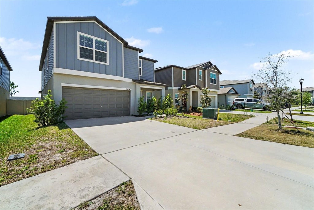 Photo of 35194 Ackley Trace, Zephyrhills, FL 33541 (MLS # TB8553063)