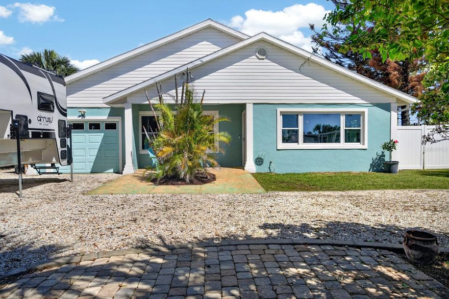 Welcome to the heart of Ormond Beach beachside, where coastal convenience meets timeless charm and modern comfort. This 3-bedroom, 2-bath Beach House has been thoughtfully updated to restore the charm of old Florida living while delivering today's modern finishes. Inside, you'll find refinished hardwood floors throughout, updated lighting and new coastal fixtures, cedar-lined closets, and a light-filled open floor plan designed for both everyday living and entertaining. A new picture window welcomes natural light, enhancing the warmth and character of the dining area. The kitchen features a relaxed coastal aesthetic with a center island, tile backsplash, custom wood cabinetry, and seamless flow into the main living areas. A sunken living room adds architectural interest, complete with travertine tile flooring and a built-in wet bar with beverage refrigerator and custom cabinetry--perfect for hosting or unwinding after a day at the beach. The private primary suite serves as a true retreat, offering cedar-lined closets and a beautifully renovated en-suite bath with a walk-in shower and floor-to-ceiling aqua marine tile. Two spacious guest bedrooms share a well-appointed bath with a tiled tub and ample storage. Situated on a rare 147-foot deep lot, the outdoor space is equally impressive, featuring mature palm tree landscaping, a circular driveway, and a paver patio overlooking a fully fenced backyard--ideal for entertaining, relaxing, and with plenty of room to add a POOL. Ideally located just one block from the Atlantic Ocean, this beautifully updated home offers easy beach access only two blocks south at Amsden Avenue and two blocks north at Standish Drive--perfect for morning sunrises, evening strolls, and effortless coastal living. Recent updates include HVAC (2016) with new condenser, roof (2021), exterior paint (2022), paver patio (2023), guest bath renovation (2023), primary bath renovation (2023), new drywall (2026), front picture window (2026), refinished hardwood floors (2026), and fresh interior paint (2026).