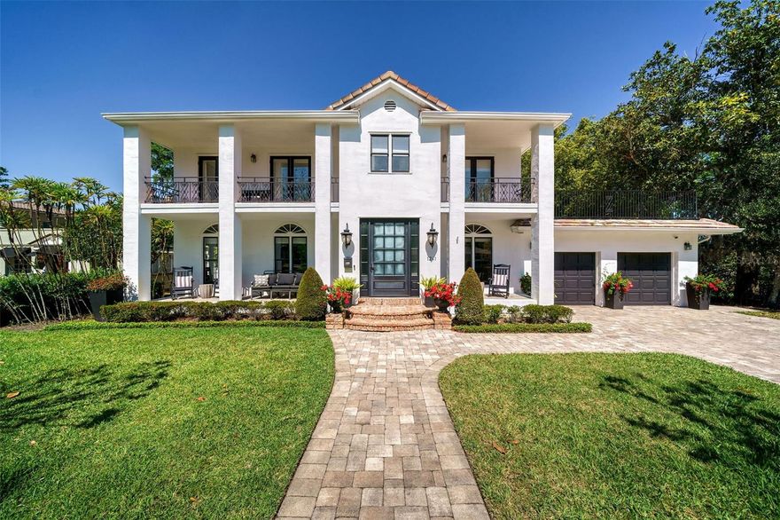 Welcome to the epitome of lakeside luxury living in the esteemed Spring Lake neighborhood. This stunning residence, originally erected in 1936, has been splendidly renovated to merge timeless charm with contemporary elegance. Overlooking beautiful Spring Lake and the Country Club of Orlando golf course, this home sits majestically on over half an acre, offering unparalleled views and privacy.

Step inside and be greeted by a grand foyer adorned with original marble floors, intricate millwork, and graceful arched doorways leading to the dining and entertainment spaces. The chef's dream kitchen boasts top-of-the-line Wolf & Viking appliances, Sub-Zero refrigeration, custom cabinetry, exquisite marble countertops, and a built-in Miele coffee station.

Entertainment knows no bounds with a spacious game room, two built-in bars, and a sprawling family room featuring five sets of French doors framing the lush backyard and tranquil lake beyond. The first floor also features a bedroom suite, laundry/mudroom, half bath and access to the basement. Upstairs, retreat to the expansive master suite complete with a cozy fireplace, spa-like bath featuring a triple-head shower and soaking tub, along with three additional bedrooms, an office/craft room, upstairs laundry, and a rooftop terrace offering panoramic views. 

Outside, the travertine deck beckons for alfresco gatherings, complemented by a summer kitchen. A large dock with room for your ski boat, a built-in jet ski slip and seawall add to the allure of lakefront living.

The Spring Lake neighborhood is a golf cart friendly neighborhood located within convenient proximity to Downtown Orlando, College Park shops and restaurants, the Packing District, Advent Health, and so much more! Easy access to both I-4 and the 408.

Experience the serenity of this lakefront estate - watch the virtual tour and schedule your private showing today!
