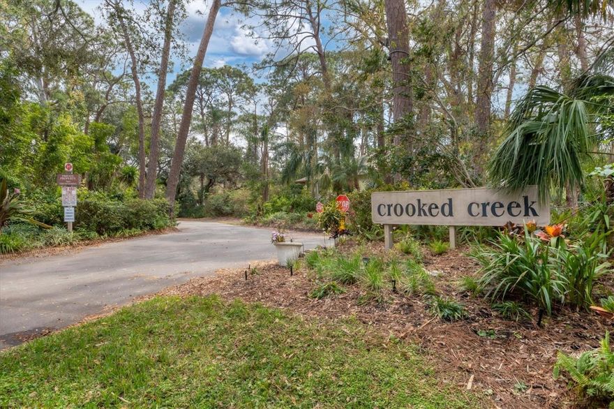 “Turn-Key Serenity Meets Sarasota Convenience—Step Into Nature Without Giving Up Location."
Don't miss this First-Floor Condo That Lives Like a Home—Open, Airy, and Wrapped in Nature.

Welcome to this beautifully updated, 2-bedroom, 2-bath residence in the desirable community of Crooked Creek. Purchased and updated in 2021, this unit is completely Turn-Key!!!  The condo has been thoughtfully enhanced, including the conversion of a spacious 10' x 26' Florida room into additional living space, featuring floor-to-ceiling impact windows and sliding glass door that fills the home with natural light and makes you feel one with the nature, right outside your door.

Offering over 1,450 square feet of living space, the layout is ideal for both everyday comfort and entertaining. Additional interior updates include NEW A/C 2024, new ceiling fans, recessed lighting, blinds, updated bathroom vanities, countertops, and toilets, Tile flooring throughout, as well as a large roll-out pantry closet and a washer and dryer (2021) located in a separate hallway laundry closet.

The kitchen is equipped with updated appliances (2021-2024), including a brand-new refrigerator (Dec 2025), wood cabinets, a rolling kitchen cart, along with ample seating at the breakfast bar, kitchen table, and dining area. Sleeping accommodations include two large bedrooms and two sleeper sofas, providing flexibility for guests.

Enjoy a private covered carport, plenty of open guest parking, and an inviting open-air front patio. Crooked Creek offers an exceptional community setting with newer roofs (2019+), a newly renovated clubhouse kitchen, a resurfaced Heated pool, Tennis court, Pickleball, Gazebo, grilling area (2 grills), Car wash area, community storage shed with designated space, and a peaceful environment bordering the Red Bug Slough Preserve—where residents can enjoy the 72 acre preserve offering 7 miles of walking/biking trails, a lake for fishing. You will definitely enjoy scenic views and local wildlife right from your backyard. The community is well managed and financially sound, with HOA fees reduced from 2025 rates of ($671 per month) to $632.00 per month in 2026, reflecting ongoing improvements and responsible stewardship.

Conveniently located near beaches, shopping, dining, and all that makes Sarasota so special, this move-in-ready home provides the perfect blend of nature, comfort, and accessibility.