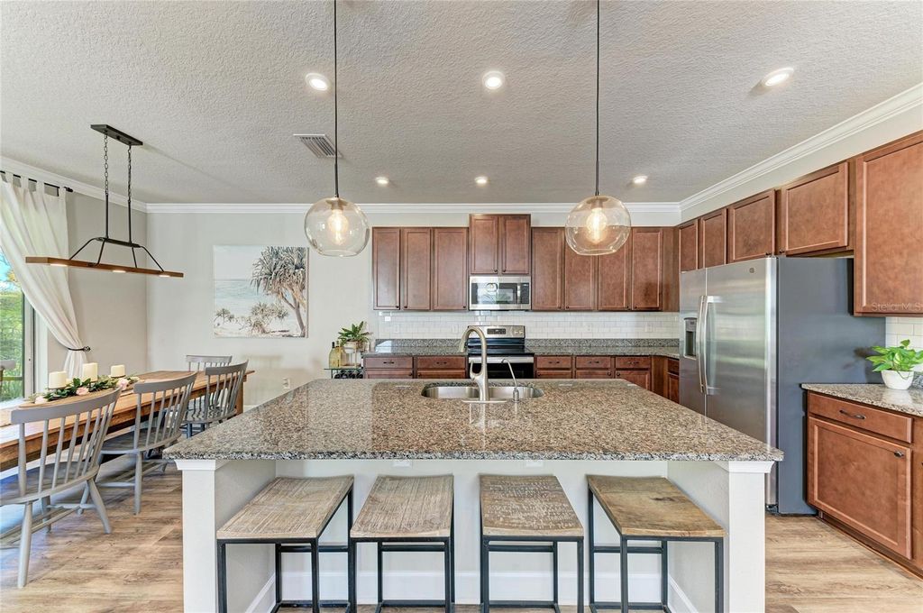 Photo of 8523 Rain Lily Crossing, Parrish, FL 34219 (MLS # A4668677)