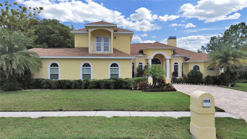 Photo of 1312 Fishing Lake Drive, Odessa, FL 33556 (MLS # TB8377652)