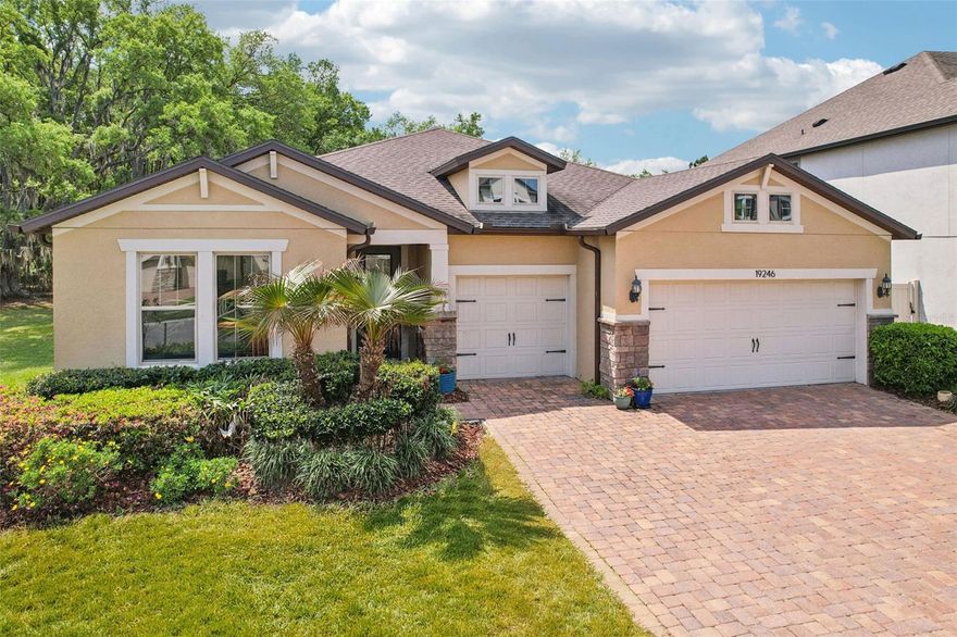 Experience the perfect blend of space, style, and location in this exceptional home located in the desirable K-Bar Ranch community of New Tampa. TUCKED AWAY ON A PEACEFUL CUL-DE-SAC, this property sits on a PREMIUM CONSERVATION LOT with no neighbors to the right, offering privacy and tranquil surroundings.
Inside, you’ll find 4 bedrooms and 3 full bathrooms arranged in a bright, OPEN FLOOR PLAN designed for modern living. The home was designed with HIGH CEILINGS AND UPGRADES SUCH AS 8-FOOT DOORS, AND  5¼-INCH BASEBOARDS that set it apart. A SECONDARY BEDROOM WITH A PRIVATE EN SUITE BATH provides a flexible option for guests or extended family, or multi-generational living.
The expansive primary suite is a true highlight, featuring a GENEROUSLY SIZED LAYOUT, PRIVATE ACCESS TO THE LANAI, AND DUAL WALK-IN CLOSETS.
The open kitchen is both functional and stylish, complete with a LARGE ISLAND AND BREAKFAST BAR, PENDANT LIGHTING, 42-INCH WOOD CABINETRY WITH CROWN MOLDING, GRANITE COUNTERTOPS, AND UPGRADED STAINLESS STEEL APPLIANCES. The SLEEK GLASS COOKTOP HAS A STYLISH HOOD VENT, AND A LOVELY TILE BACKSPLASH, AND SPACIOUS PANTRY round out this first-rate, modern kitchen. The adjoining dinette area overlooks the outdoor living space, making everyday meals feel truly special.
A standout feature of the home is the OVERSIZED LAUNDRY ROOM, OFFERING A UTILITY SINK, ABUNDANT CABINET STORAGE, AMPLE COUNTER SPACE, AND HIGH-END WASHER AND DRYER INCLUDED.
Step outside to enjoy Florida living at its finest on the EXTENDED COVERED AND SCREENED LANAI—perfect for entertaining or unwinding. The OVERSIZED BACKYARD provides ample space to add a custom pool or create your own private retreat.
Residents of K-Bar Ranch enjoy access to RESORT-STYLE AMENITIES INCLUDING A CLUBHOUSE, POOL, PLAYGROUNDS, SPORTS COURTS FOR BASKETBALL, TENNIS, AND PICKLEBALL, AS WELL AS SCENIC WALKING TRAILS. Plus, the community borders a wilderness preserve, giving you easy access to outdoor activities like hiking, biking, canoeing, and fishing.
This home offers the lifestyle you’ve been looking for—private, spacious, and conveniently located in one of New Tampa’s most popular communities.