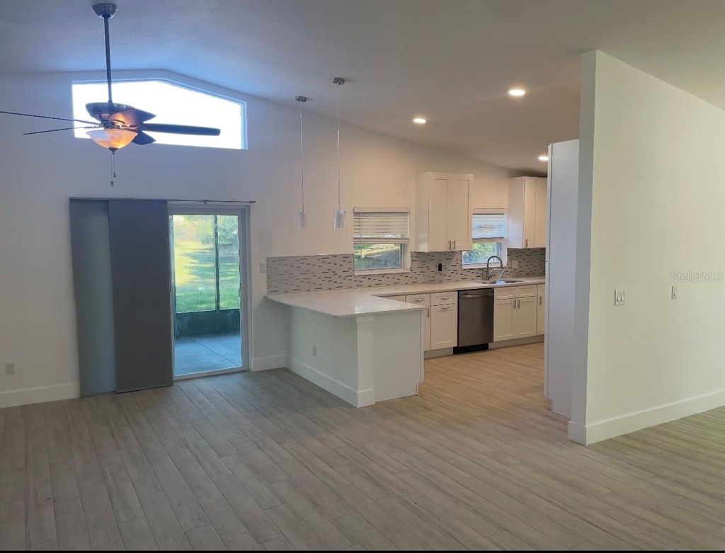 Photo of 7235 Hunterdon Drive, Orlando, FL 32835 (MLS # O6390102)